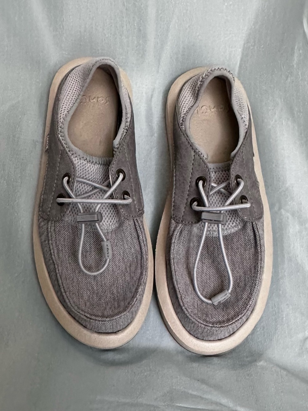 ⁠Sanuk Women's Boatie ST slip-on boat shoes in grey.